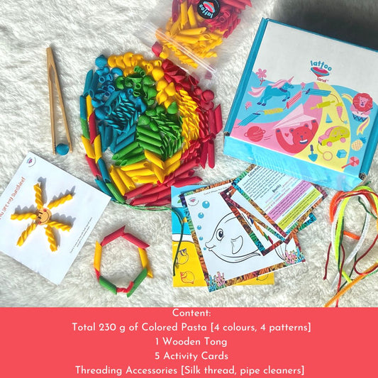 A child engaging with the DIY pasta crafts from the kitchen play toys for kids set, enhancing creativity, color recognition, and early childhood development. 230g of coloured Pasta, 1 wooden tong, 5 activity cards for kids, threading accessories