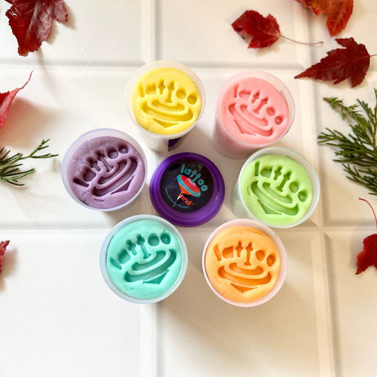 A colorful set of Lattooland Pastel Play Clay Dough featuring six soothing pastel shades: pink, blue, green, yellow, purple, and peach. Perfect for kids' creative play and sensory activities.