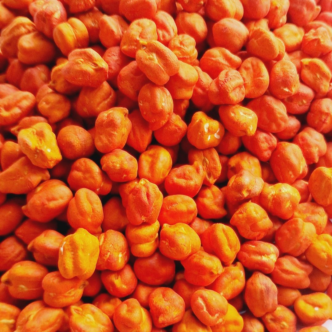 Natural brown sensory chickpeas filler, featuring smooth, earthy-toned chickpeas. Perfect for sensory play, this filler offers a grounding, rustic tactile experience ideal for open-ended activities.