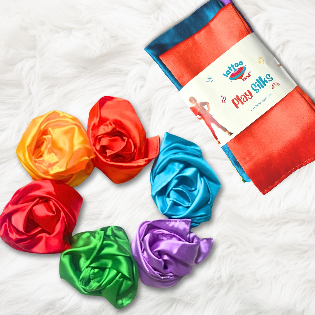Brightly colored sensory PlaySilk scarves designed for babies and toddlers, promoting tactile exploration and creative play. Soft, smooth fabric ideal for sensory stimulation and early childhood development