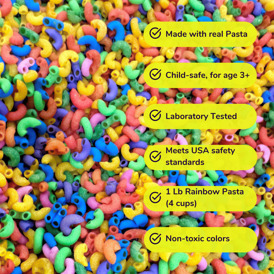 A close-up of colorful elbow macaroni pasta filling the frame, with six yellow text callouts on the right listing benefits such as made with real pasta, child-safe, laboratory tested, meets USA safety standards, 1 lb rainbow pasta (4 cups), and non-toxic colors.