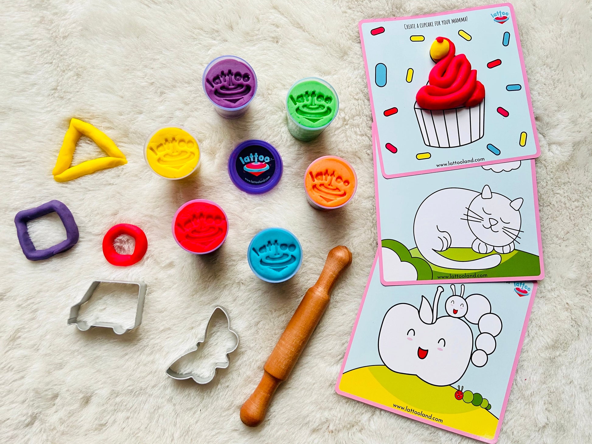 3 durable, double-sided mats perfect for hands-on play and creative arts and crafts activities. 6 bright colored clay dough in tubs, car clay cutter & butterfly dough cutter, kids dough kneader & activity mat