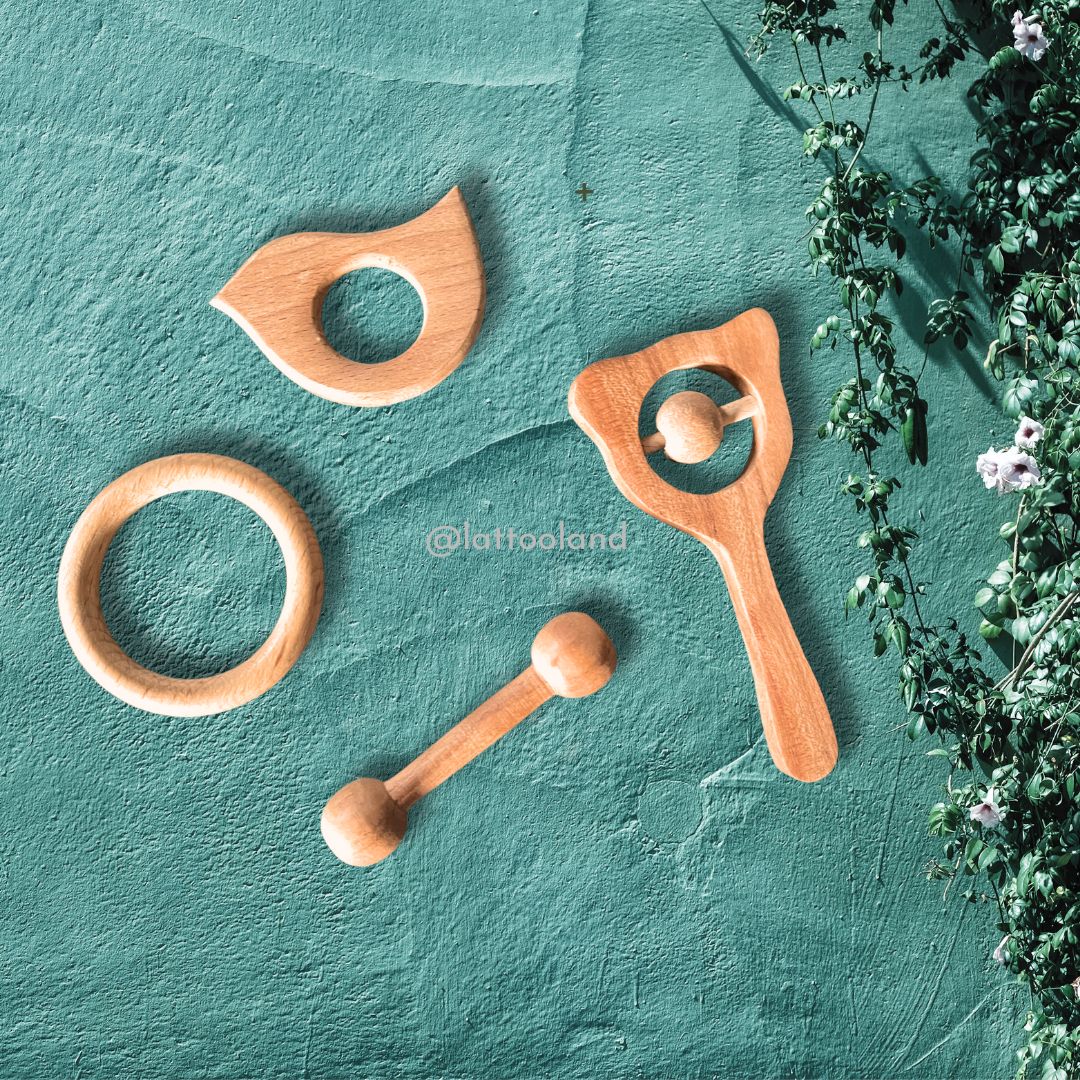 Natural wooden teether toy soothers for babies, crafted from 100% non-toxic beech wood, providing gentle teething relief and promoting sensory development in an eco-friendly design.