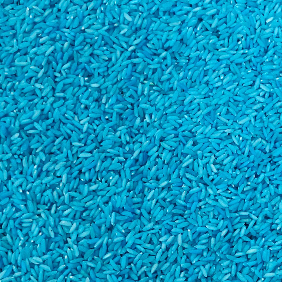 Montessori sensory play using blue color rice for kids