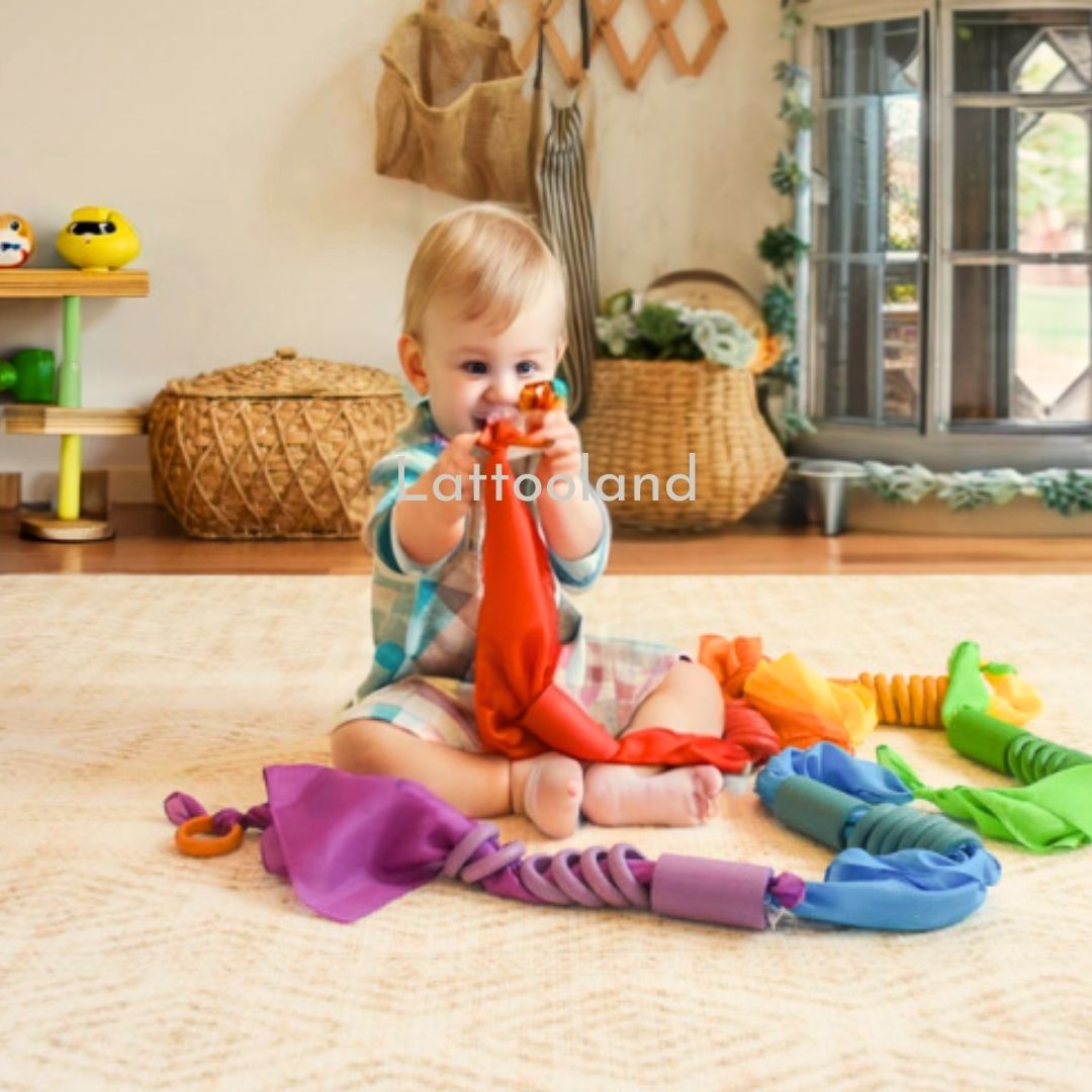 Rainbow play scarf used as a sensory and movement toy for children